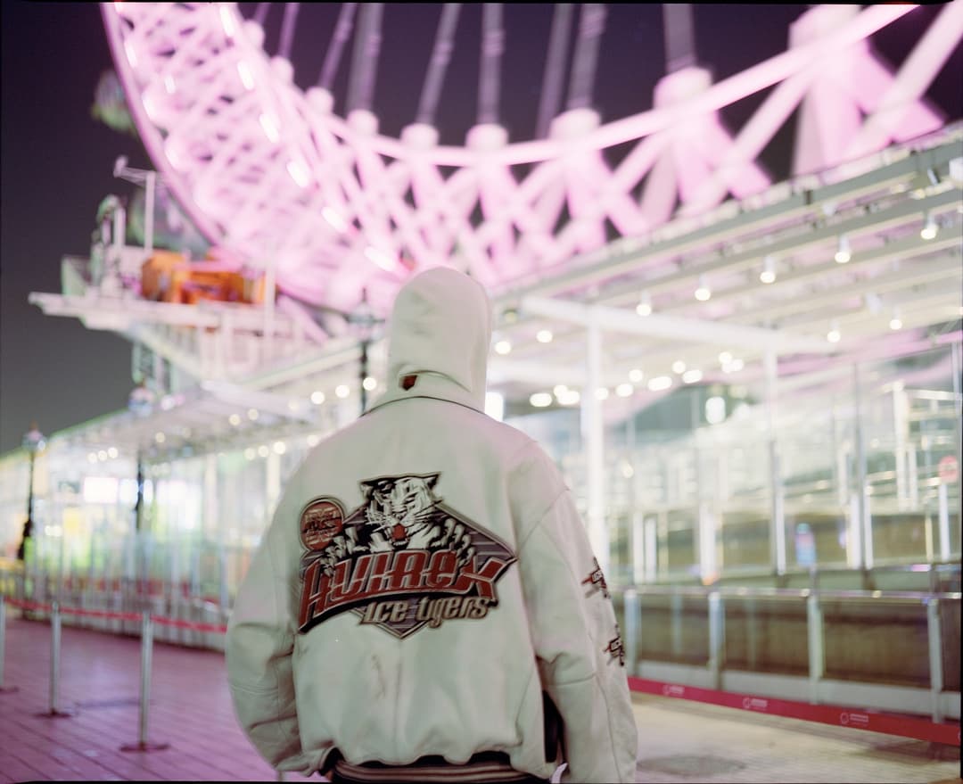 White hoodie, pink London Eye – London