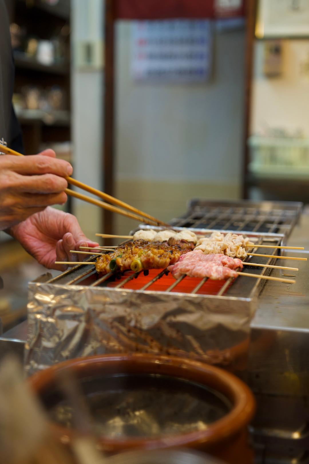 Hands at the grill – Yamagata, Japan