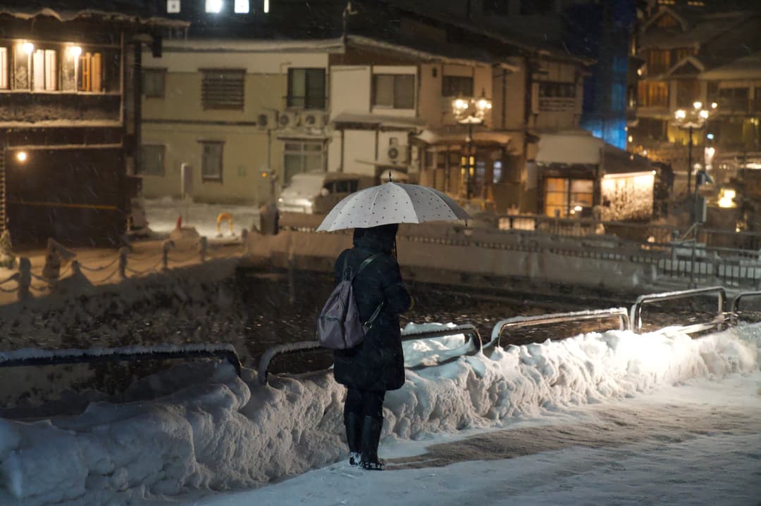 White umbrella in the snow – Ginzan Onsen, Yamagata