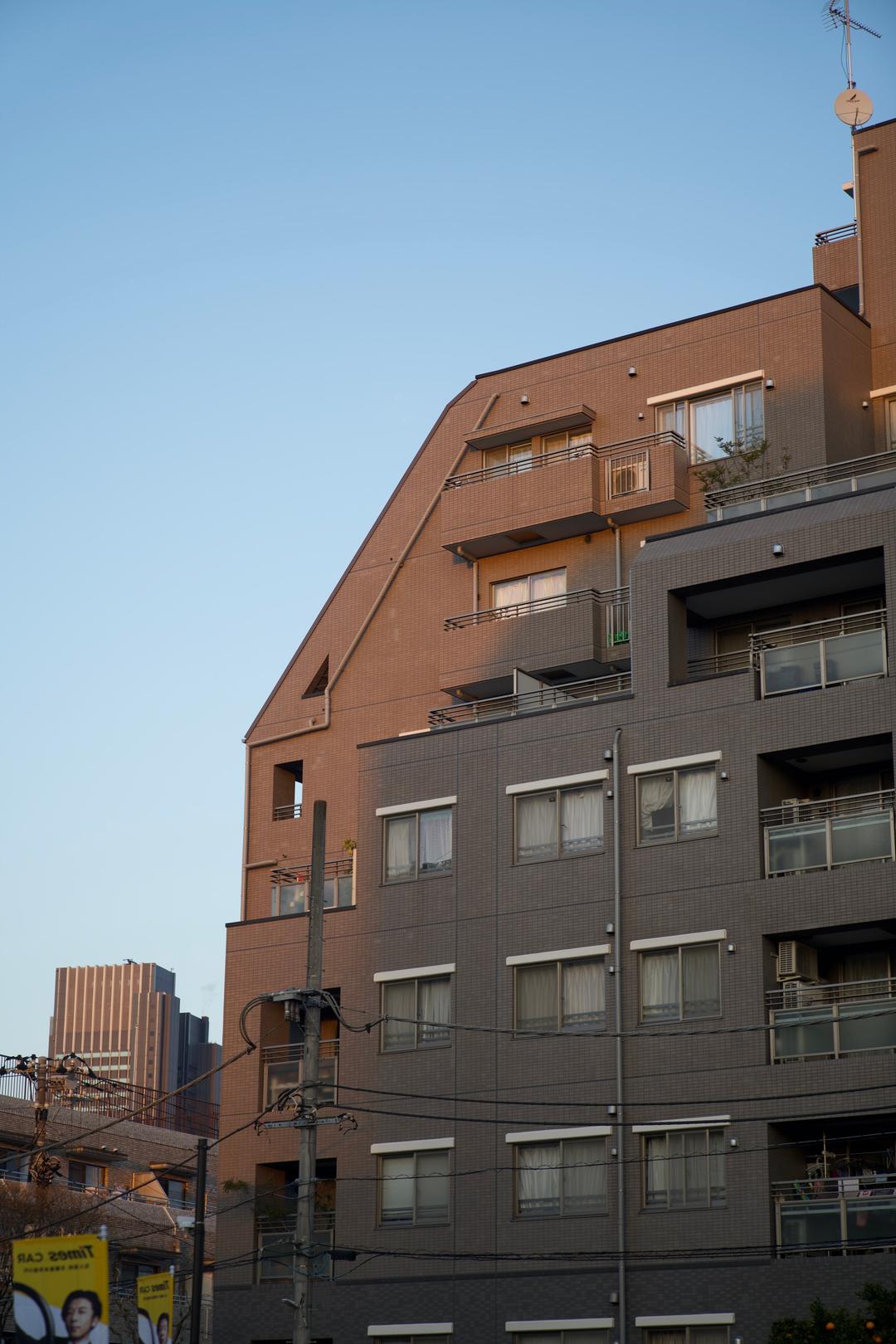 Peach building and blue sky – Tokyo, Japan