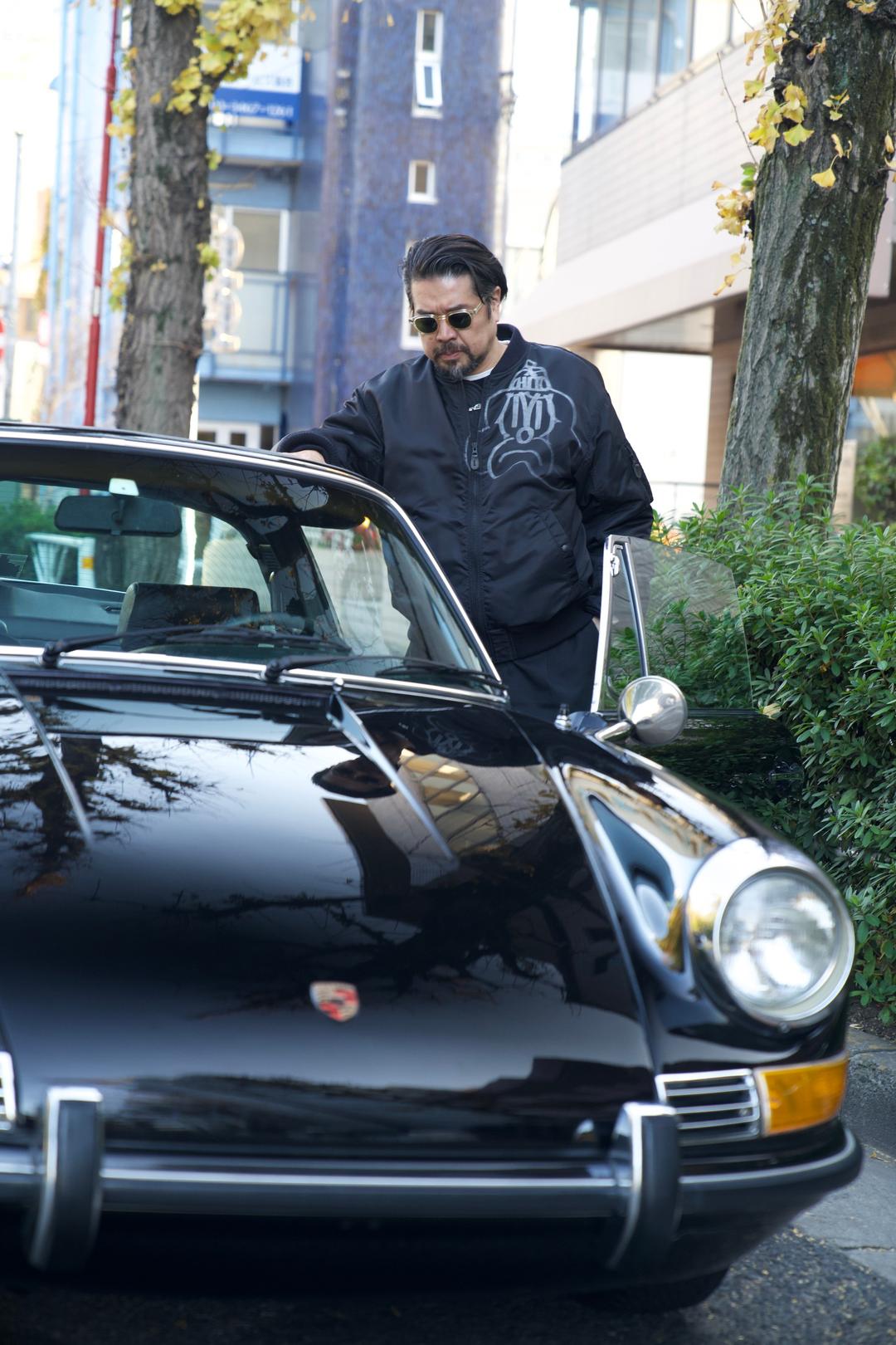 Driver beside the classic car – Tokyo, Japan