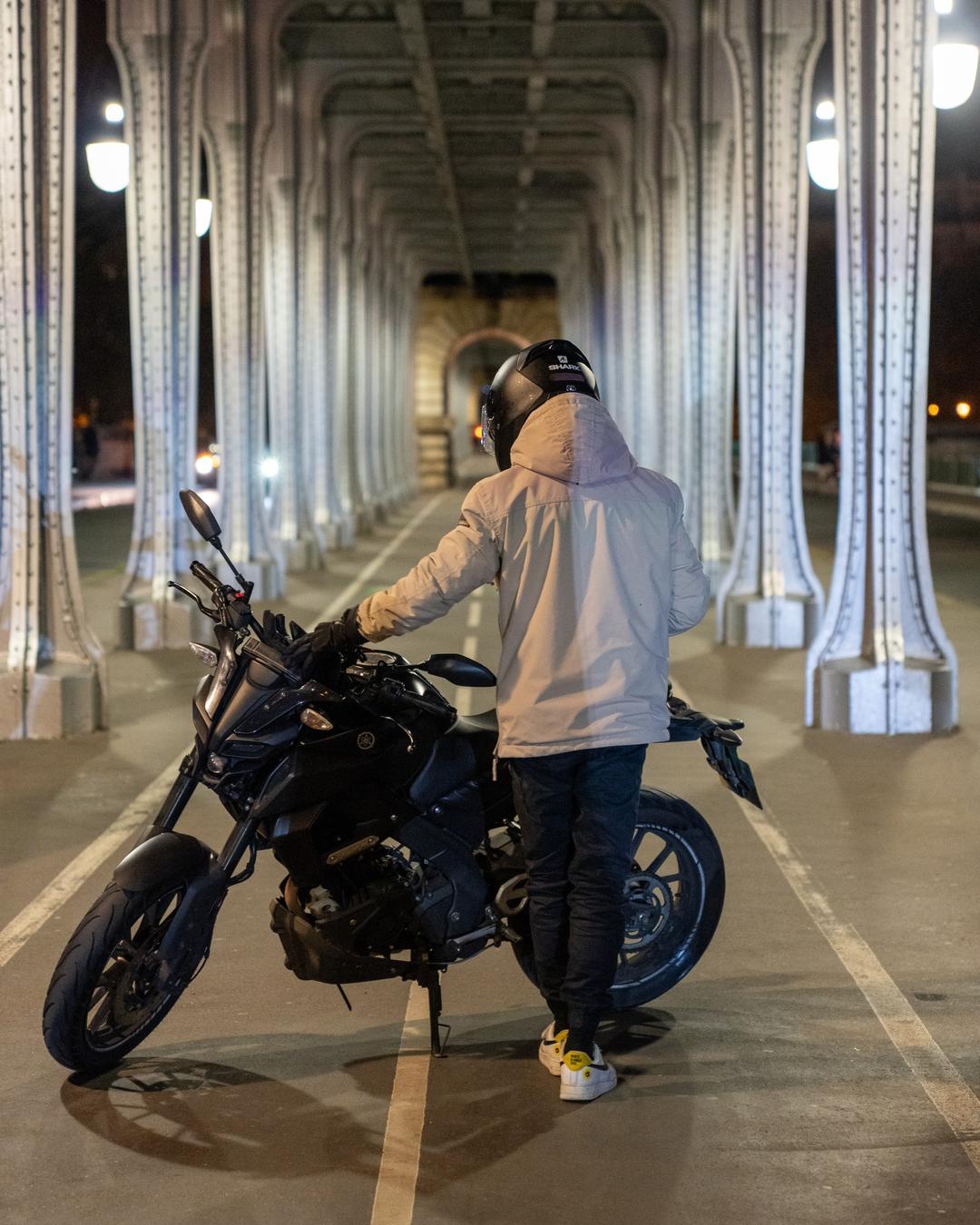Rider beneath the columns – Paris, France