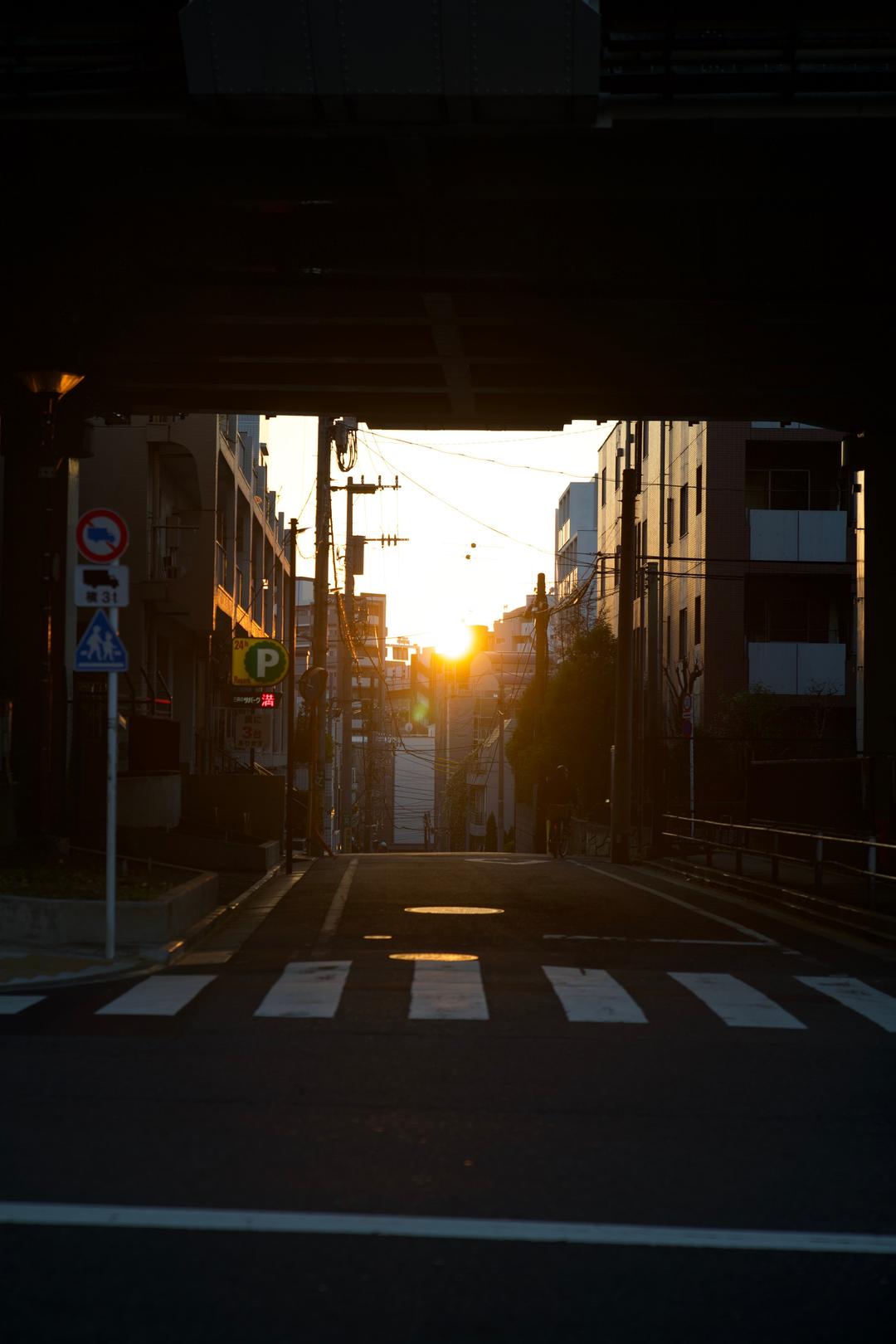 Sun under the overpass – Tokyo, Japan